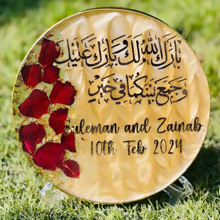 7.2-inch personalized resin wedding plate with Arabic calligraphy and rose petals.