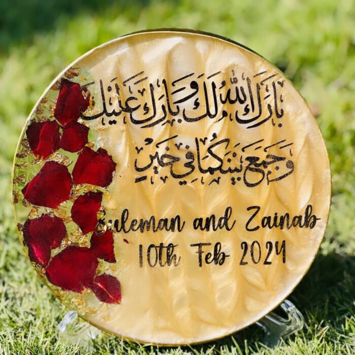 7.2-inch personalized resin wedding plate with Arabic calligraphy and rose petals.