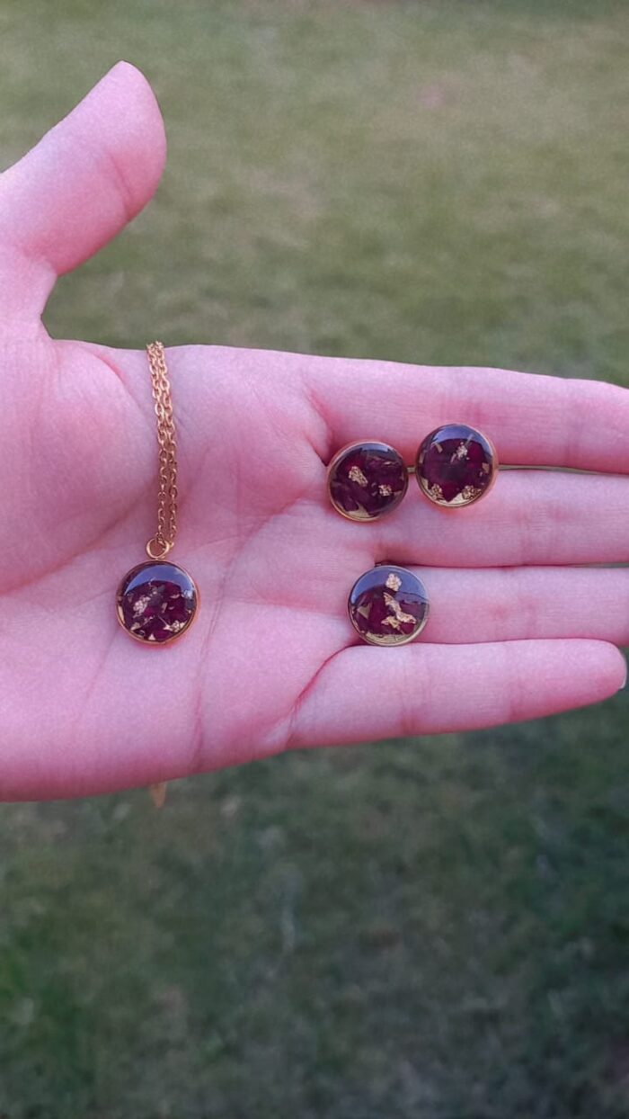 Handcrafted resin jewelry set featuring 12mm gold foil studs, matching pendant with chain, and adjustable ring.